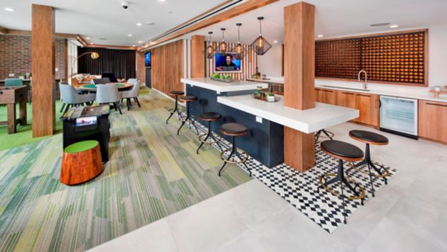 Interface Driftwood plank carpet tile in residence lounge